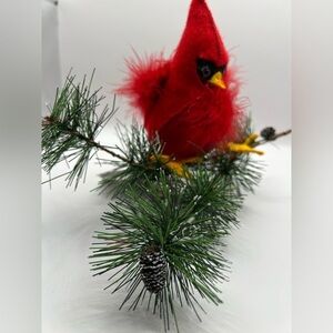 Annalee Cardinal on a faux pine branch
